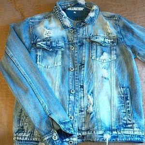 Distressed blue denim jacket. by trillnation